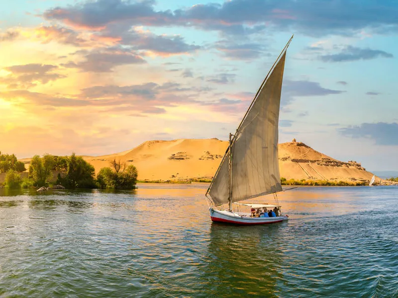 Sailboat on river Nile at sunset in Aswan