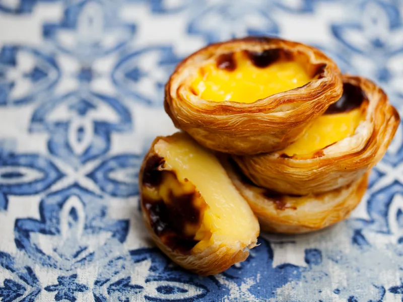 Try Pastel de Nata custard tarts in Lisbon