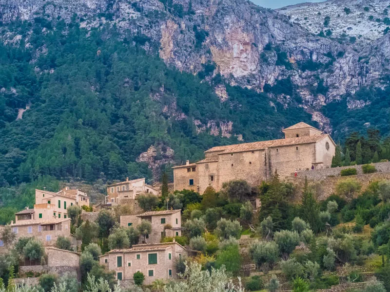 Deia village in a remote valley in the Serra Tramuntana mountain range